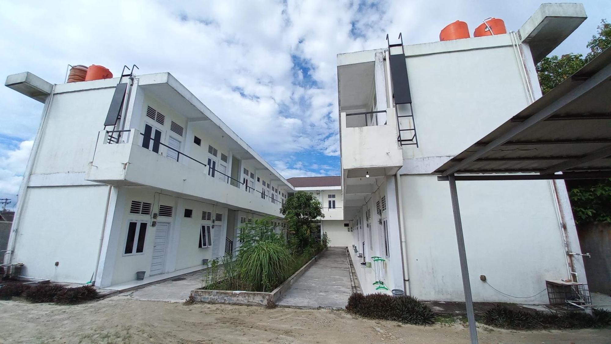Hotel Spot On 93326 Anie Syariahnearjembatan Siak 2*